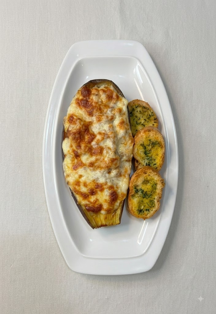 Berenjena rellena y gratinada con queso de cabra